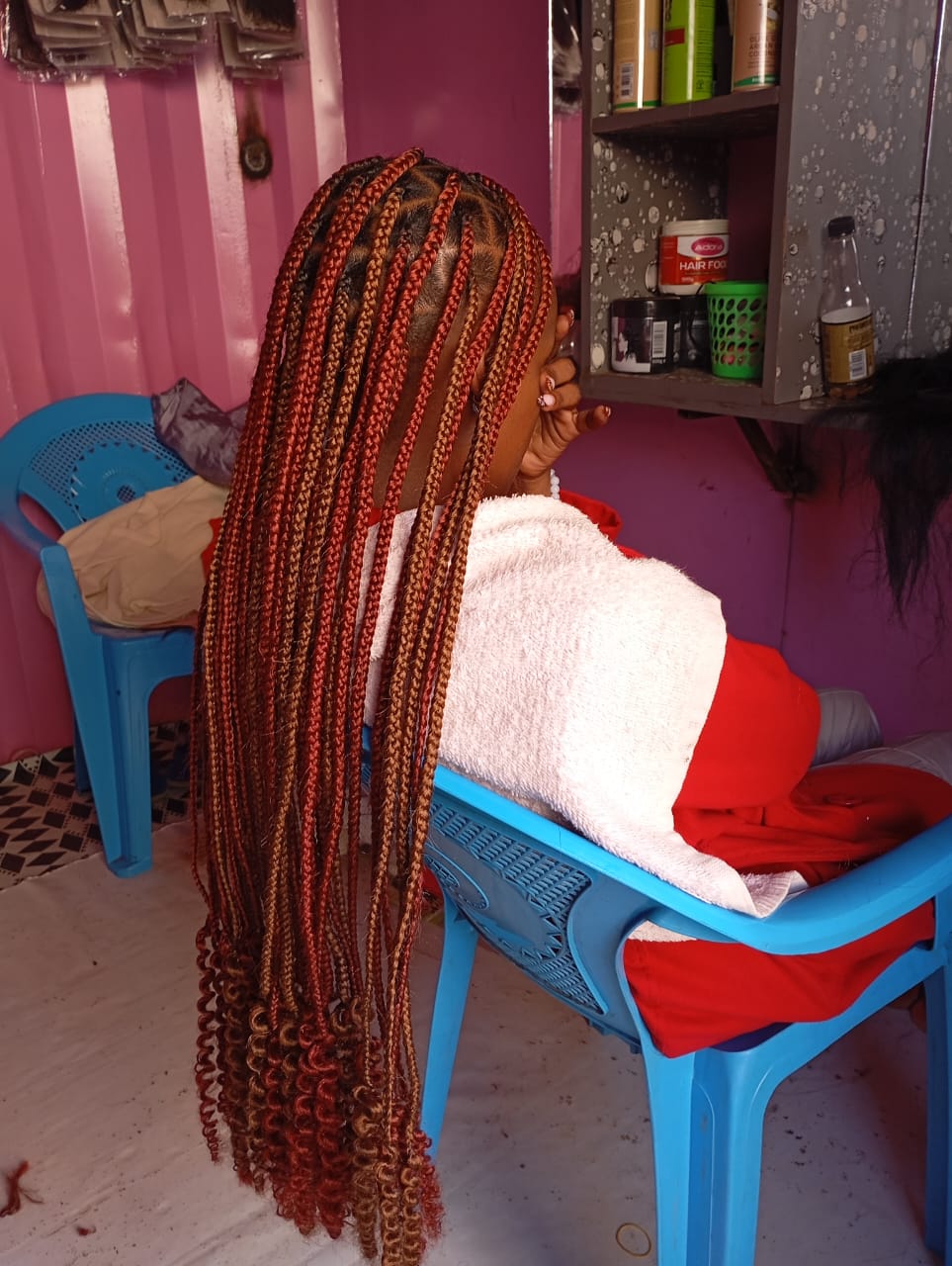 Professional braiding service at Blessed Rayna Salon